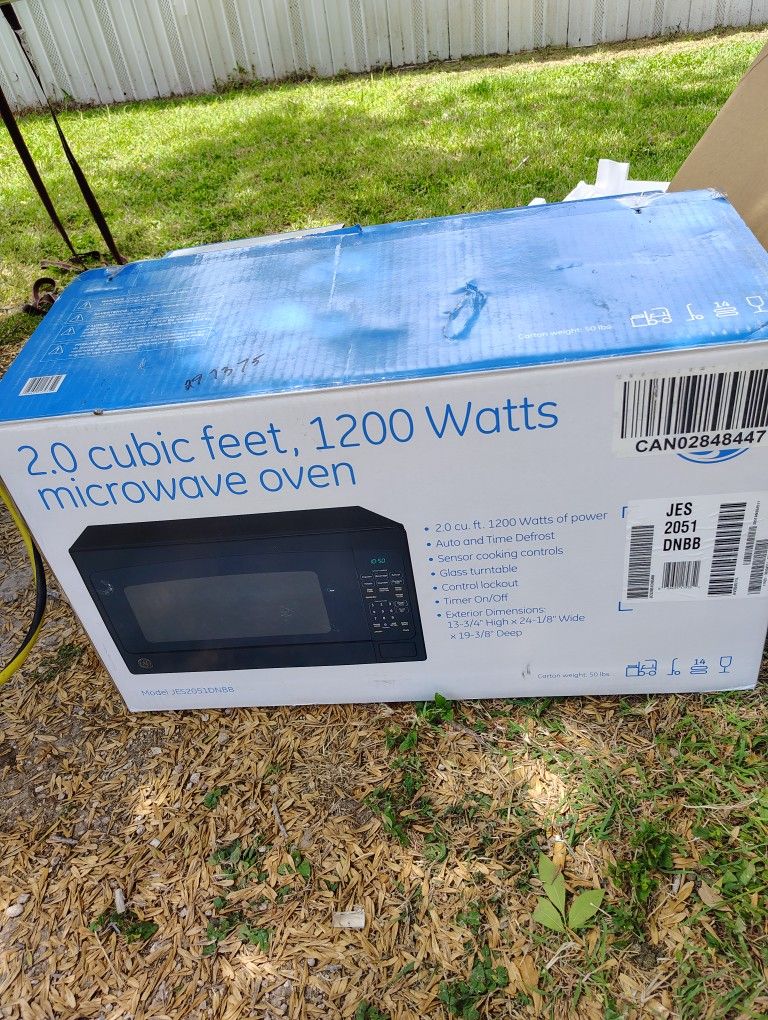 Microwave New With Dent No Plate for Sale in Pharr, TX OfferUp