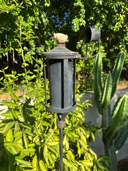 4 Tiki torches w/ canisters