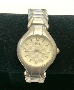 Ladies L.E.I. Life Energy Intelligence Silver Tone Textured Dial 7"