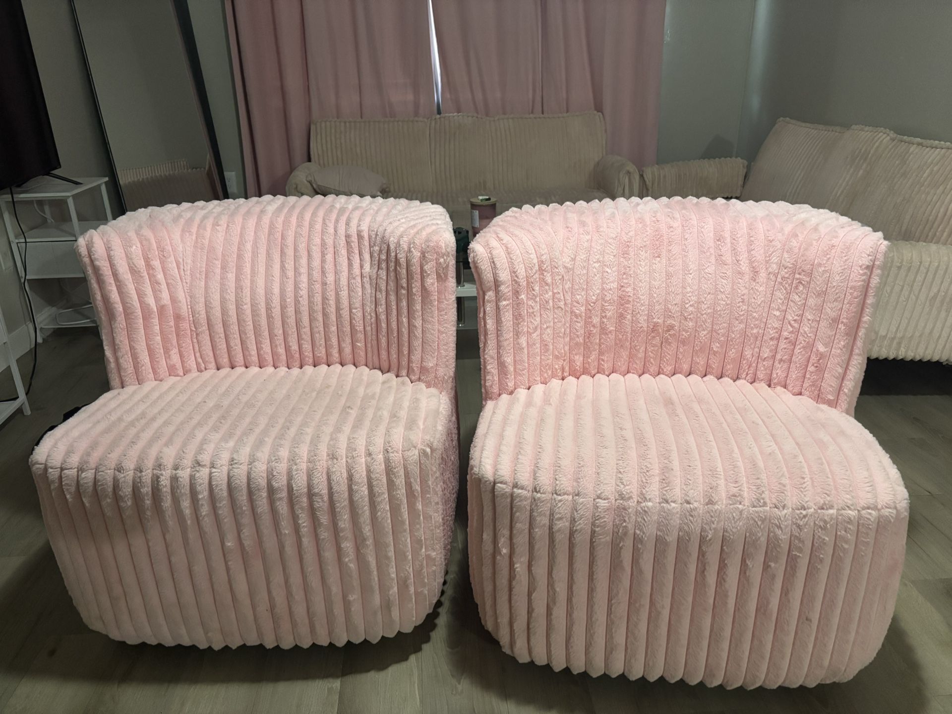 PINK SWIVEL ACCENT CHAIRS 
