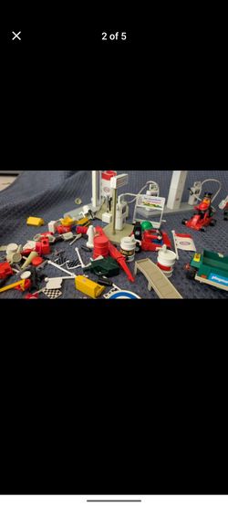 Vintage Playmobil ESSO Gas Station, and three sets of car, some racing cars included!! Great deal!