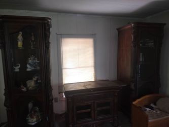 Beautiful vintage entertainment center with China cabinets