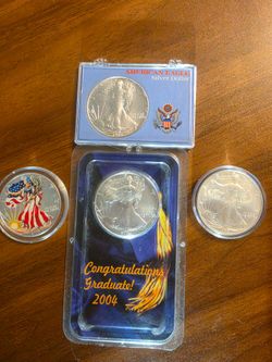 Four (4) One Oz Silver American Eagles!!