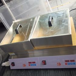 This device is a commercial Japanese souffle pancake maker, also commonly used for making dorayaki. 