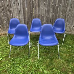 Blue Naugahyde and fiberglass Stackable Eames Chairs For Herman Miller 