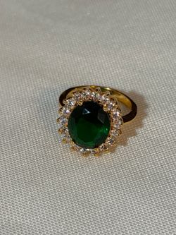 Beautiful emerald and cubic zirconia ring
