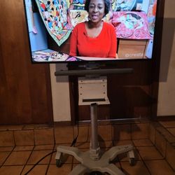 Samsung 40Inch. Smart  TV With Rolling  Stand Up Adjustable On Wheels Mobile Cart  Desk 
