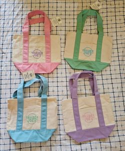 Traders joes mini totes pastel colors.