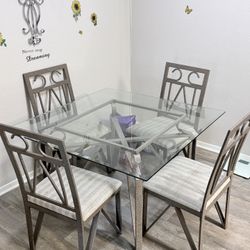 Dining room glass table and chairs 