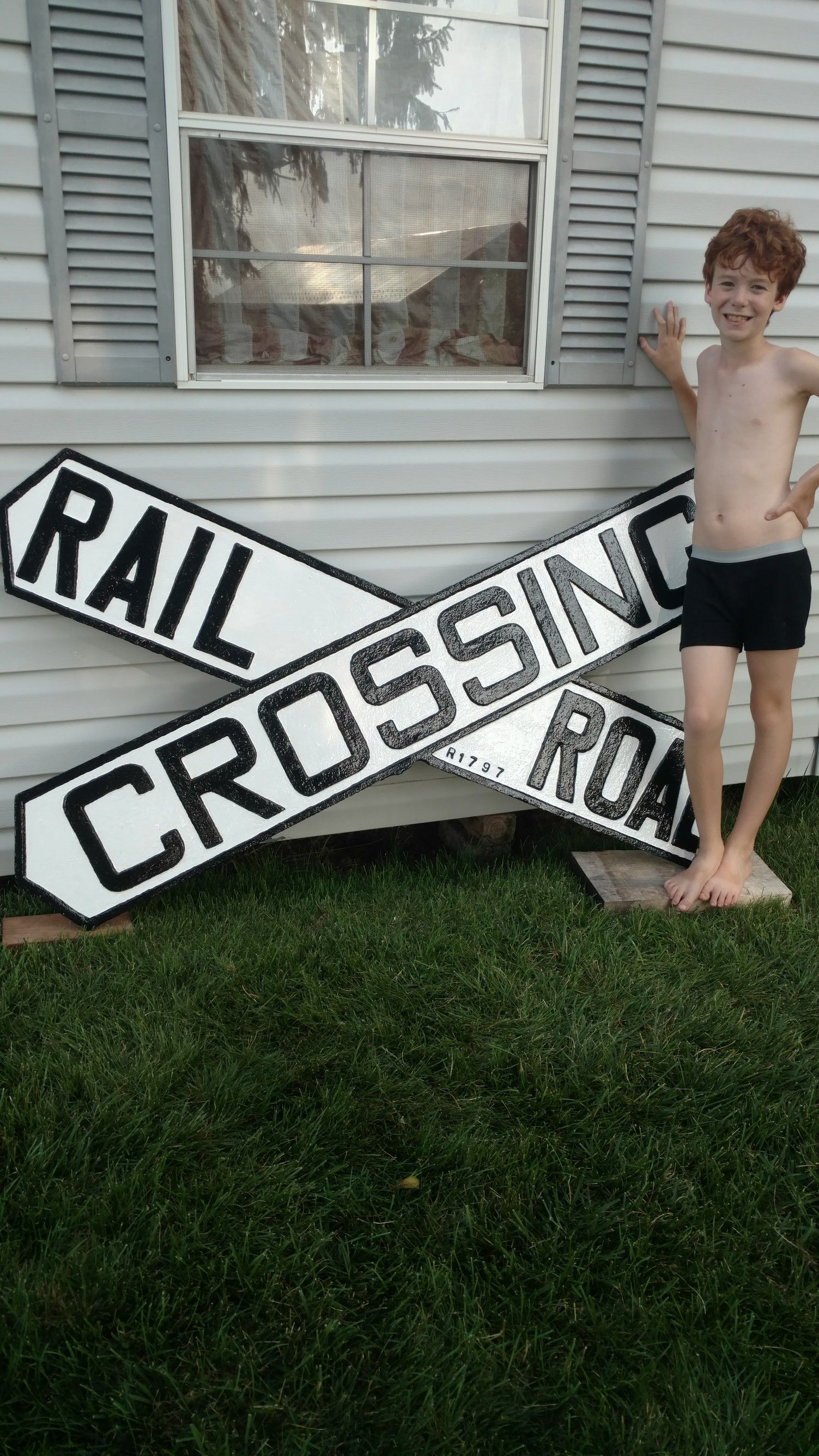 Antique cast iron railroad crossing sign