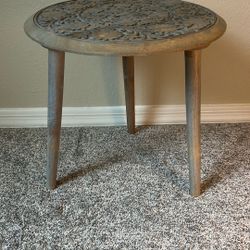carved wood side table