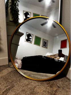 gold circular mirror