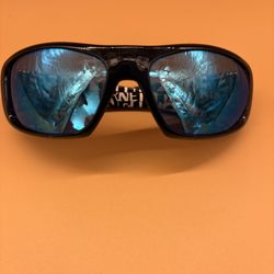 Black Arnette sunglasses with blue mirror lenses