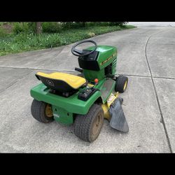 John Deere STX38 with Lawn Sweeper 42 Inch