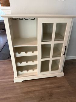 White Wood Cabinet with Glass Sliding Doors