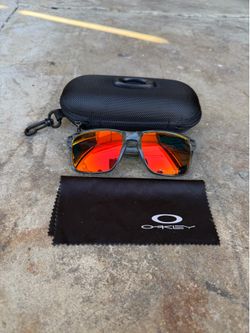 Oakley Holbrook Sunglasses Ruby Red Fire Iridium Prizm Lens Crystal Clear Black Frame