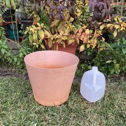 15” x 12 1/2”H Plastic Orange Planter w/ Attached Saucer
