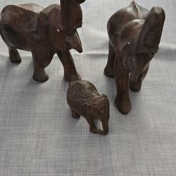 Wooden Carved Family Of Elephants