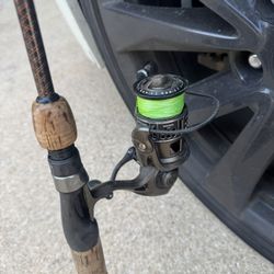 Pflueger Supreme Fishing Reel With Ugly Stick 