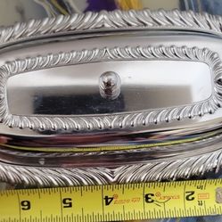 Silver colored butter dish
