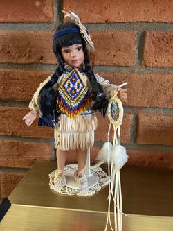 Collective porcelain Indian doll