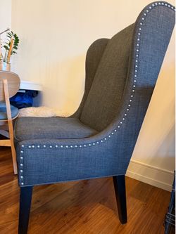 Gray upholstered wingback accent chair / desk chair / bedroom chair