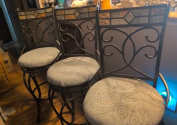Three oil rubbed bronze metal and tile bar stools