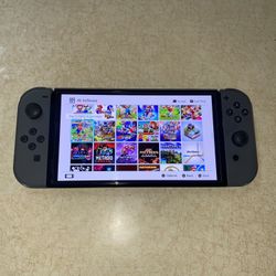 NINTENDO SWITCH OLED MOD with 100 SWITCH GAMES INSTALLED