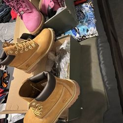 Pink Tims Size 5.5 Big Kids.$85) (Size 4.5 Tan/gold ) $85).👉🏽(2 Pairs Tims Size 12.5  Kids Tan, & Black Pairs $65 Each, Both Pairs $120.00 Used 👇🏽