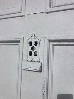 Vintage front door with peep door
