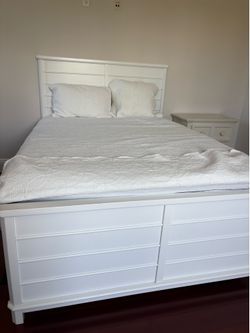 Full-size Magnussen Home Charleston panel bed in a white finish,