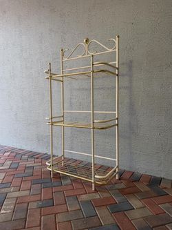 Vintage mcm regency metal bakers rack