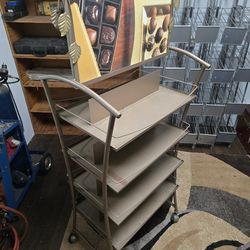 Double sided swiveling display rack
