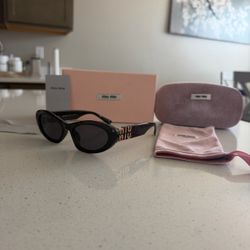 Miu Miu Black Cat-Eye Sunglasses