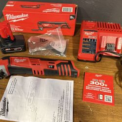 Milwaukee Oscillating multi Tool With Extras. 