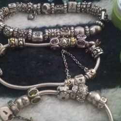 4 Pandora Bracelets  1Pandora Necklace Purple Gem...A Lot Of Beads & Charms....