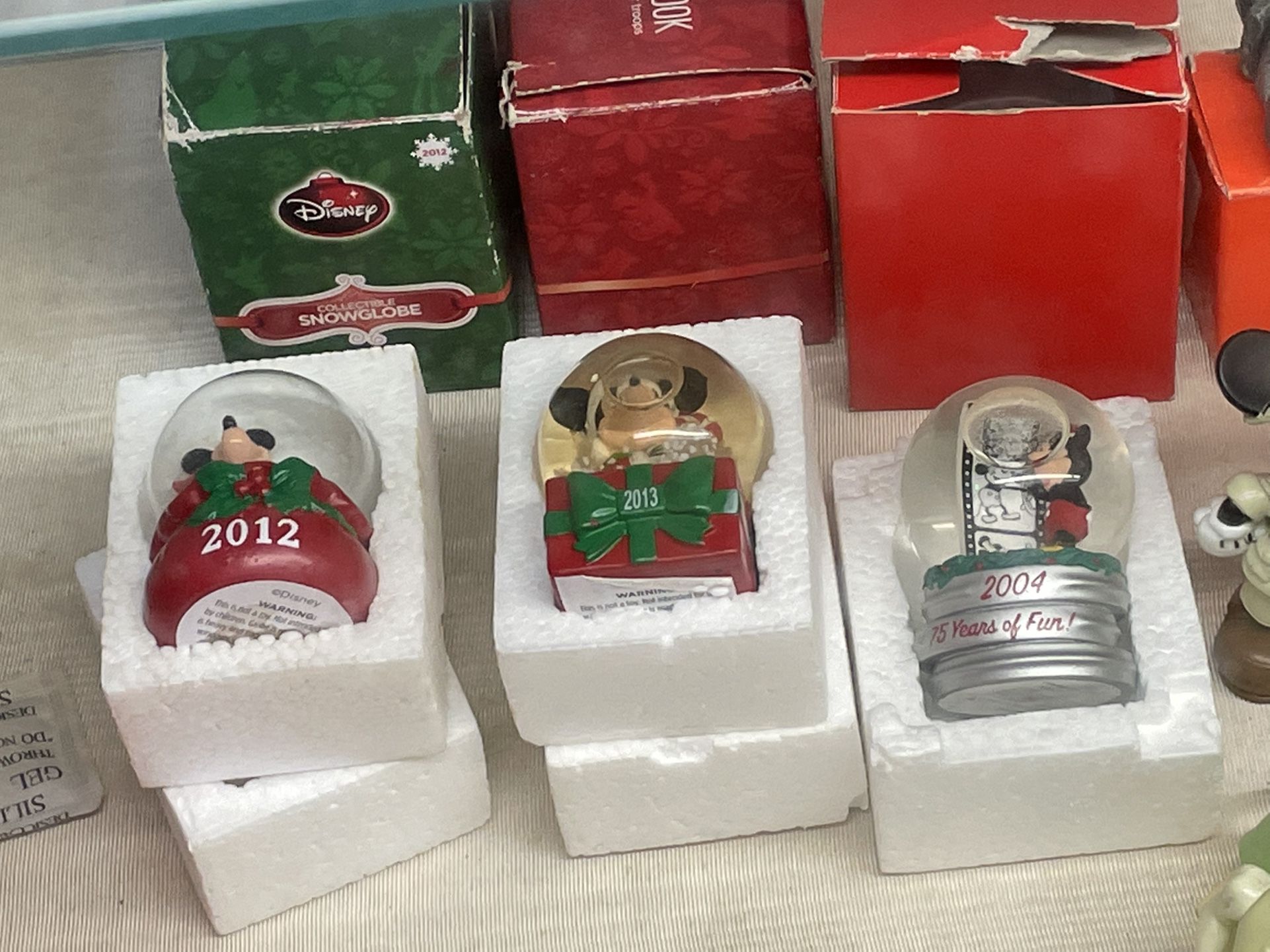 Disney Mickey Mouse ornaments and Ceramic and Snow Globes  $15 each