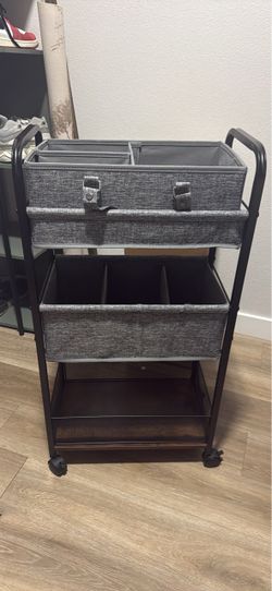 Diaper carrier with wheels