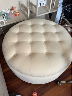 30” Cream round tuffed ottoman $50