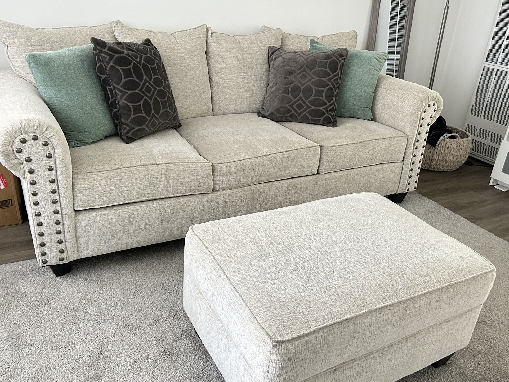 Very Good Conditions Of a Sofa &Ottoman and rug :)