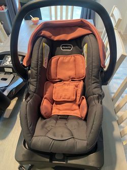 Evenflo Baby Car Seat used but in very good condition. Comes with 2 car bases . In like new condition. Only used a few times. Black / Pink Color