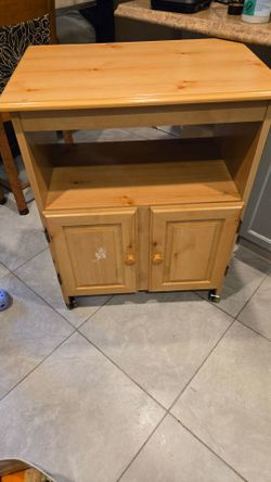 classic vintage style blonde pine rolling utility cart