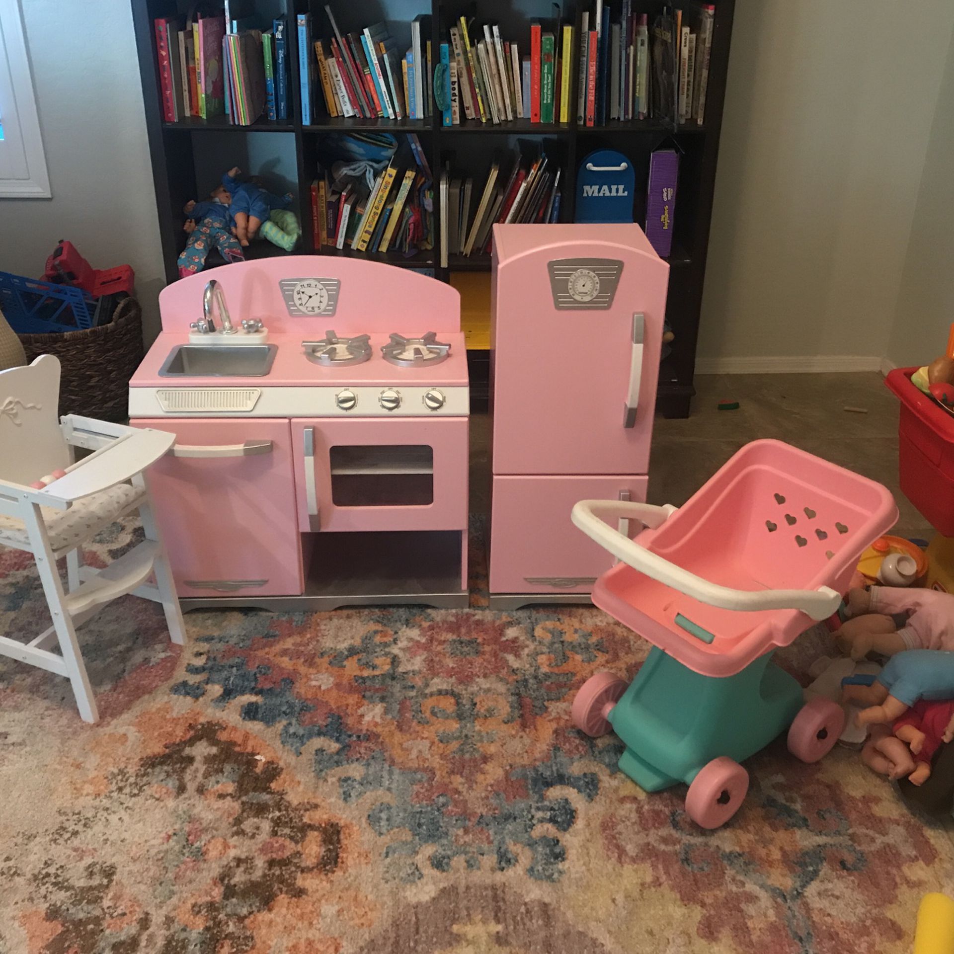 Pink Wooden Play Kitchen, Stroller, and High Chair