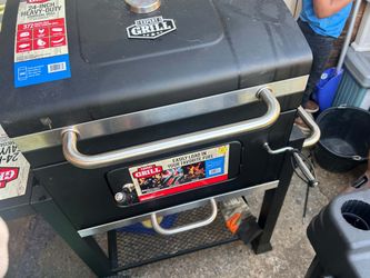 New grill ,uses charcoal wood etc