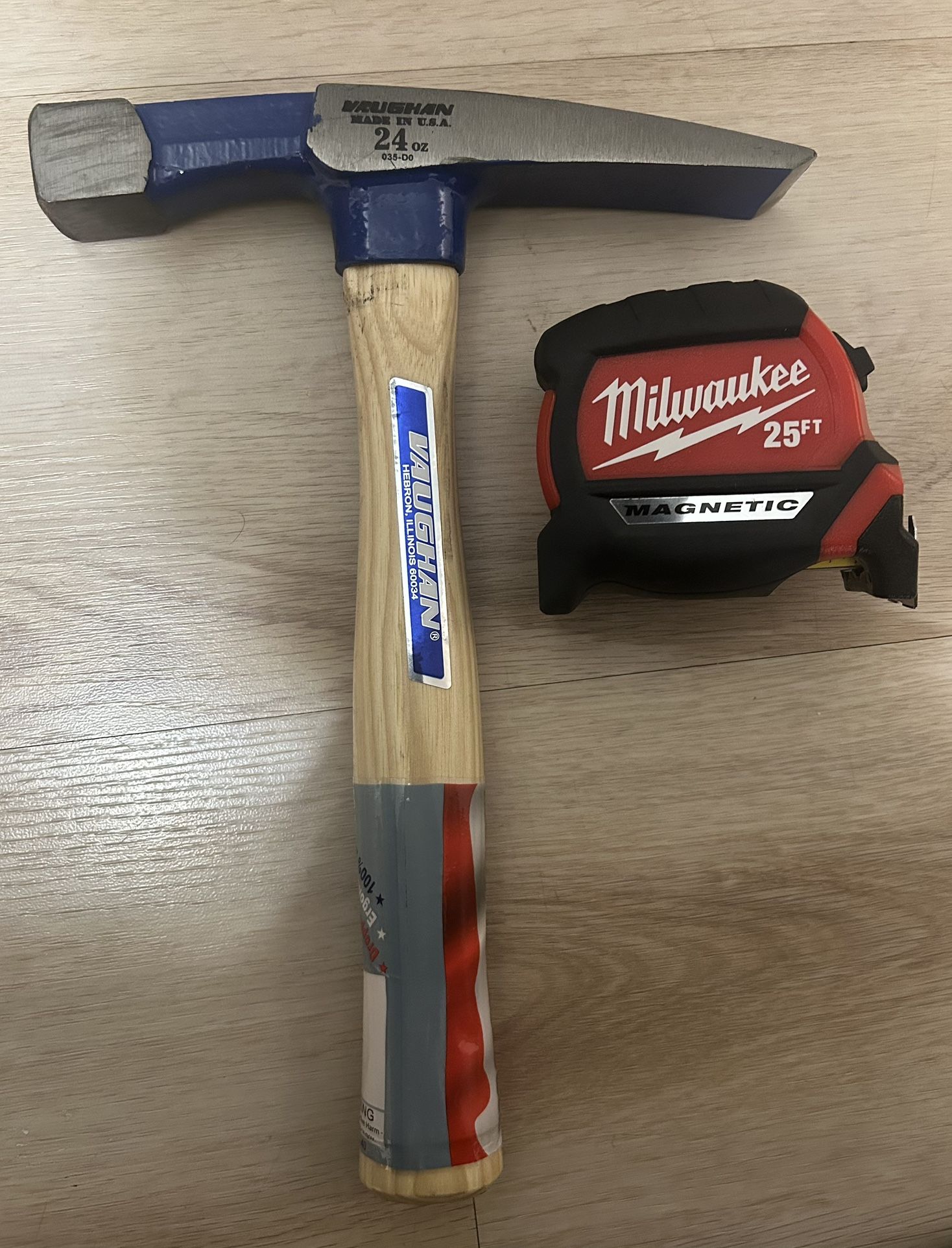 Brick Layer Hammer And Tape Measure