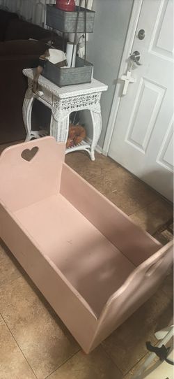 Wooden pink baby crib