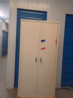2 doors metal storage cabinet $ 220