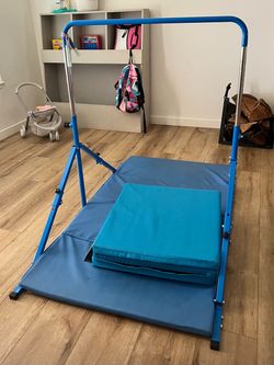 Gymnastics bar + mat