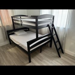 Bunk bed with mattresses.