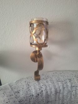 Gold candle wall sconce